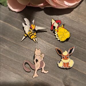 Pokemon Pins (set of 4), Pikachu, Mewtwo, Beedrill, Flareon